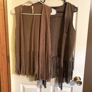 Bundle of western fringe vests